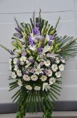 Corona funebre come da usanza locale (palma)
