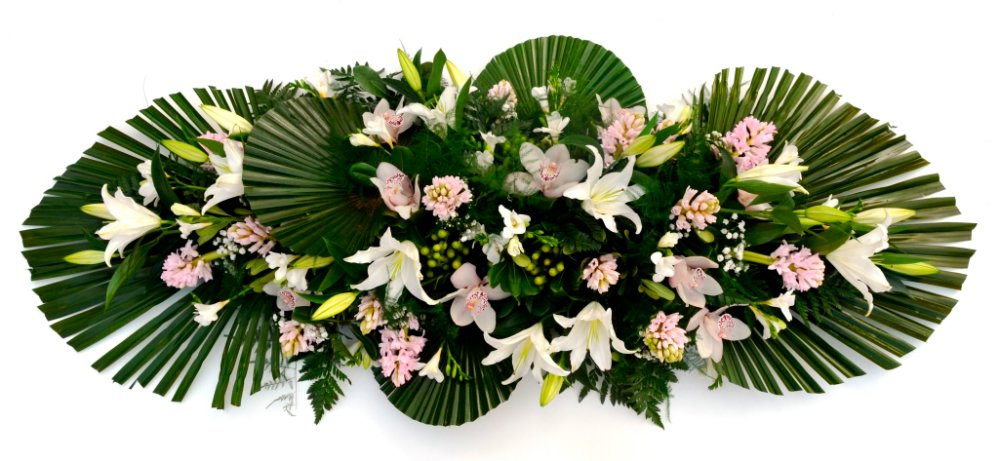 Foto White and pink sympathy arrangement.