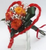 Boubuet in cornice a forma di cuore