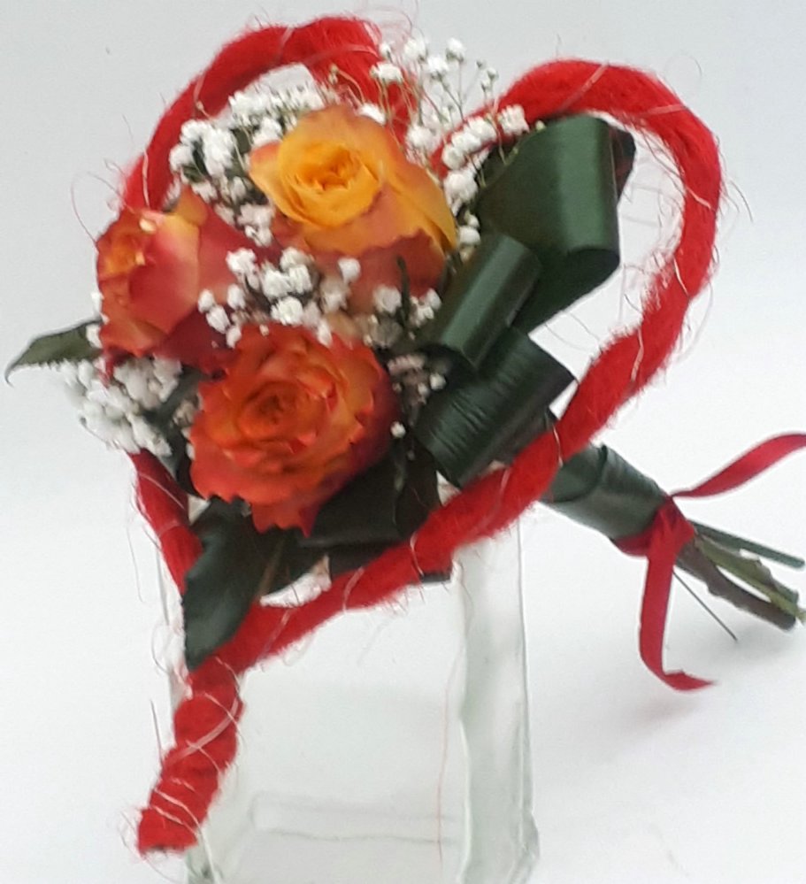 Boubuet in cornice a forma di cuore