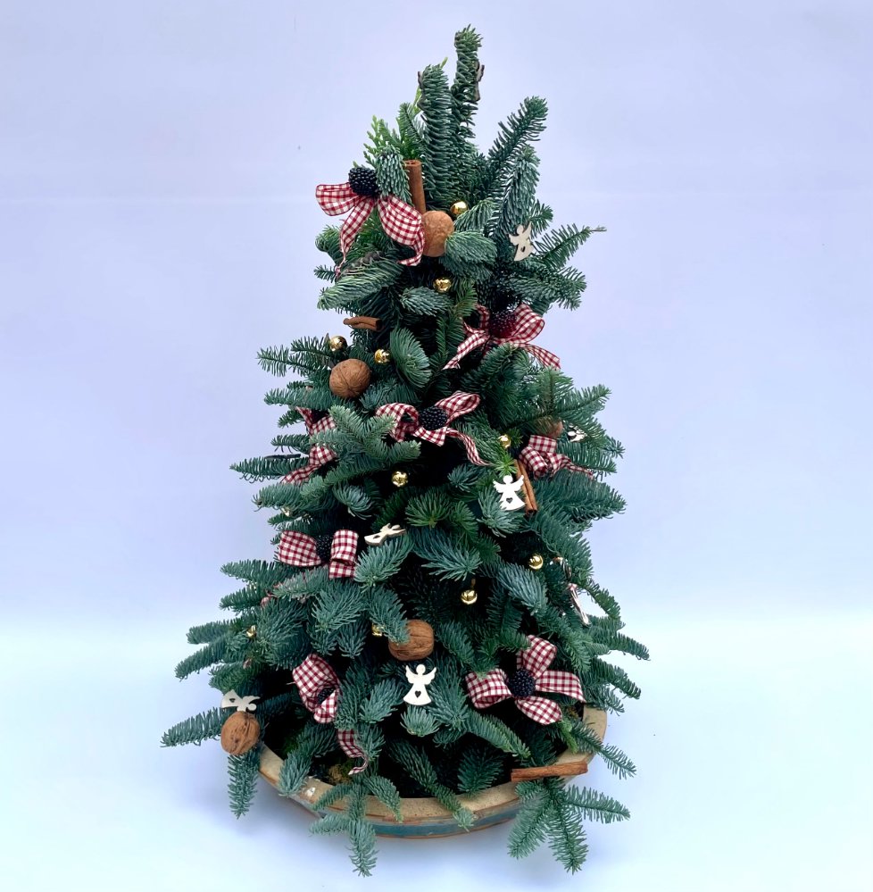 Foto Albero di natale con base in legno