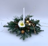 Composizione centro tavola con una candela e peluche